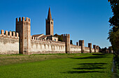 The walls of a medieval italian town, with towers and a steeple, Montagnana, Veneto