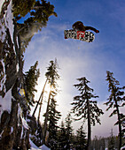 Snowboarder drops in on Yellow Rock - Mt Hood Meadows, OR.