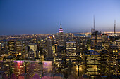 Rockefeller Center's Top of the Rock provides a fantastic bird's eye panorama of Manhattan, including the Empire State Building.  New York City, NY, May 13, 2008