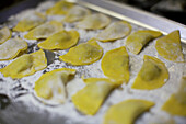 Spinach and caprino cheese ravioli are prepared at the Osteria Vecio Fritolin in Venice.