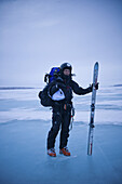 Jason Magness exits the Missori River after a long day of snowkiting during the 2XtM expedition