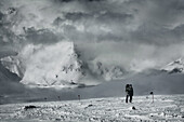 A man walking on Elbrus Mountain during Elbrus Race, the highest race in Europe.