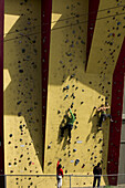 Climbers at the Stone Gardens climbing gym, Seattle, Washington, USA.