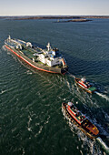 An aerial view of an oil tanker is piloted into Portland Harbor, Maine, February, 2010.