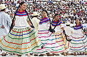 Dancers perform at the Guelaguetza Auditorium on Cerro del Fortin in Oaxaca City, Oaxaca state, Mexico on July 21, 2008. The Guelaguetza is an annual folk dance festival - dancers from all corners of the state gather in celebration in Oaxaca City and town