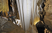 A British cave explorer admires this truly awe-inspiring crystal formation known as 'Blanc de Blanc' Whiter than White in French,. It is the jewell of this particular cave called The Felix Trombe, in the Pyrenees, France.