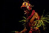 Mentawai Medicine men, covered in tattoos, perform ceremonies for visitors on Kandui Island, including dancing, chanting and smoking.