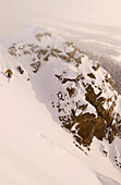 JACKSON HOLE, WY - JANUARY 6: Telemark skier Sue McGruder drops into the Crags near the Jackson Hole Mountain Resort in the Jackson Hole Backcountry on January 6, 2005 Photo by Lucas J. Gilman / Aurora