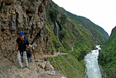 Stuart Sloat ascends a steep trail in the Humla district of remote west Nepal. The mighty Karnali River rushes below.