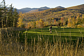 'Golfers at The Sunday River Golf Club, voted one of the top 10 courses in the world by Travel and Leisure Golf.  ''Set on the edge of the Sunday River Valley, the course is surrounded by miles of wilderness and the towering peaks of the Mahoosuc Range. I