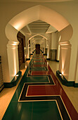 A classic arch frames a hallway, in the luxurious of the Burj al Arab Arabian Tower, the world's tallest  hotel at 321 meters, on the beach along the Persian Gulf, Dubai, United Arab Emirates.  A super luxury hotel, the Burj al Arab and its unique archite
