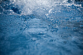 Splash in blue water.