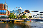 Bridge Niederbaumbruecke with Elbphilharmonie in background, Warehouse district, Speicherstadt, Hamburg, Germany
