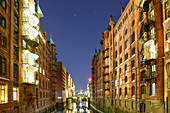 Illuminated buildings of warehouse district, Warehouse district, Speicherstadt, Hamburg, Germany