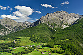 View to castle of Tarasp and Fontana with Sesvenna range in background, Lower Engadin, Canton of Graubuenden, Switzerland