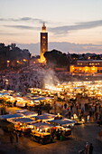 Elevated view of the Koutoubia Mosque at dusk from Djemaa el-Fna, Marrakech, Morocco, North Africa, Africa