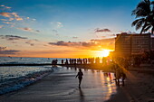 Sunset over the high rise buildings on Waikiki Beach, Oahu, Hawaii, United States of America, Pacific