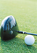 Golf ball and club, close-up