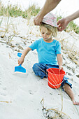 Child playing in sand