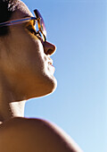 Woman wearing sunglasses, close-up