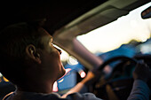 Driving at dusk, silhouette