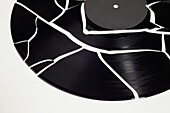 A broken record, close-up, studio shot