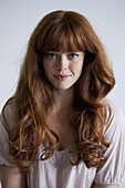 A beautiful young red haired woman, portrait