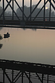 A fisherman at sunrise, Lake Havel, Brandenburg, Germany