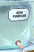 'Water purifier' with label written in Latin