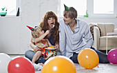 A young family celebrating a birthday