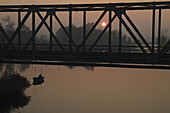 A fisherman at sunrise, Lake Havel, Brandenburg, Germany