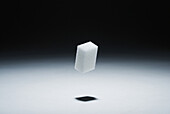 A cube of sugar in mid-air