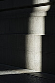 Abstract view of shadow and light against building