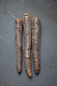 Carrots on wooden table