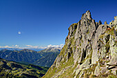 Rock formation in Lagorai range with Latemar range in background, Trans-Lagorai, Lagorai range, Dolomites, UNESCO World Heritage Site Dolomites, Trentino, Italy