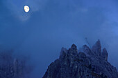 Moon above Cadini range, UNESCO World Heritage Site Dolomites, Dolomites, Veneto, Italy