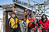 Skiers at top station, free ride skiing area Haldigrat, Niederrickenbach, Oberdorf, Canton of Nidwalden, Switzerland