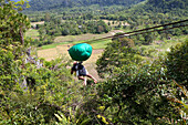 Zipline gliding on the west coast of Palawan Island, Philippines, Asia