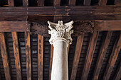 column, timber ceiling interior of entrance hall Scuola Grande di San Marco, today the city hospital, Venice, Italy