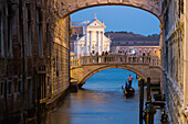 Ponte della Paglia beyond the Bridge of Sighs, background church of San Giorgio Maggiore, gondola, reflections, evening, romantic, Venice, Italy