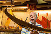 Gilberto Penzo, model builder and historian of traditional venetian wooden boats, gondola model, traditional, timber ribs, construction, Venice, Veneto, Italy