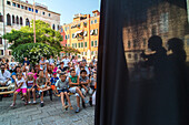 puppeteer, Massimo Tuia, street theatre, Campo  della Bragora, stage, audience, open air, Venice, Italy