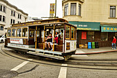 Cable car making its run in San Francisco, California.
