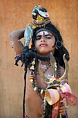 India, Rajasthan, Pushkar, Young sadhu dressed as God Shiva.