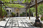 Greece, Chalkidiki, Mount Athos peninsula, World Heritage Site, Grigoriou monastery, Reading monk.