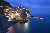 The Cinque Terre Village of Manarola at Dusk Liguria Italy.