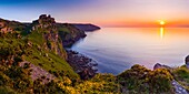 Valley of the Rocks and Wringcliff Bay at sunset in Exmoor National Park near Lynton, Devon, England.