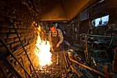 traditional blacksmith at work in Holland.