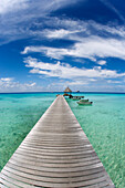 French Polynesia, Tuamotu Islands, Rangiroa Atoll, Resort Pier And Boats.