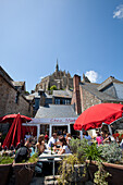 Restaurant terrace within Mont Saint Michel, Normandy, France